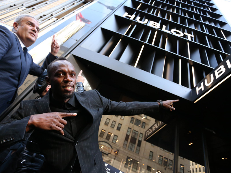 Ricardo Guadalupe y Usain Bolt.